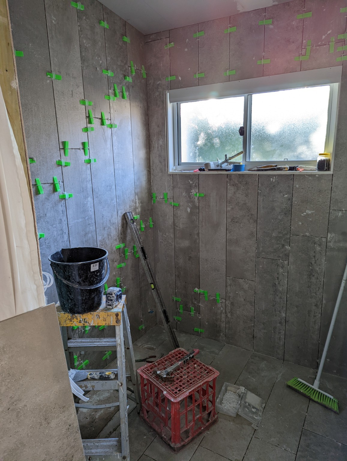 East Gosford granny flat — Bathroom wall tiling in progress