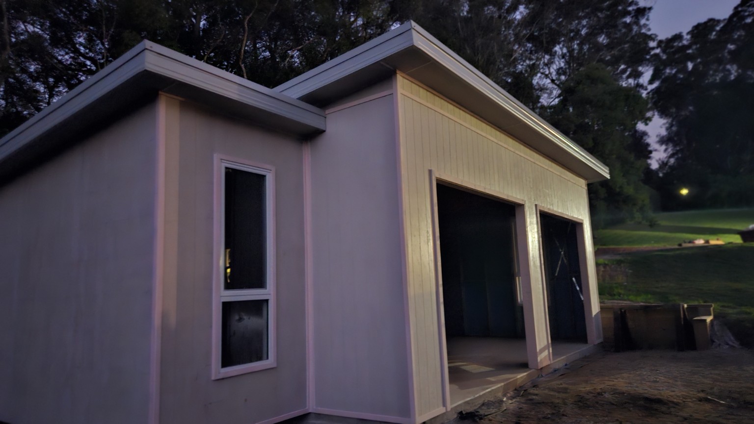 Erina Heights garage — Clad garage exterior and twin door openings
